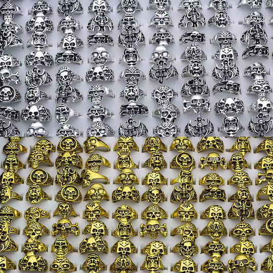 Lote de 50 anillos calaveras pequeñas plateadas y doradas